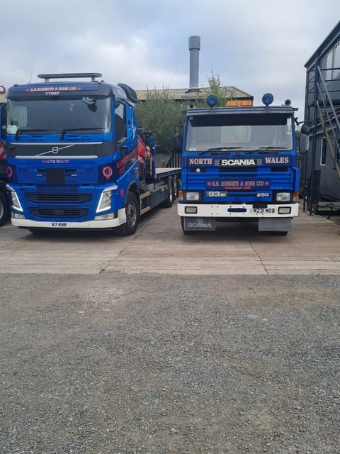 RN Roberts Volvo and vintage Scania flatbeds side by side