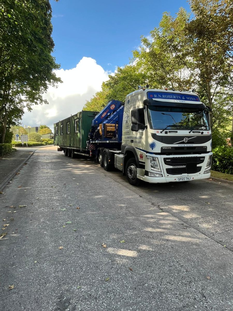 RN Roberts lorry carrying a container on the road near Liverpool and Merseyside