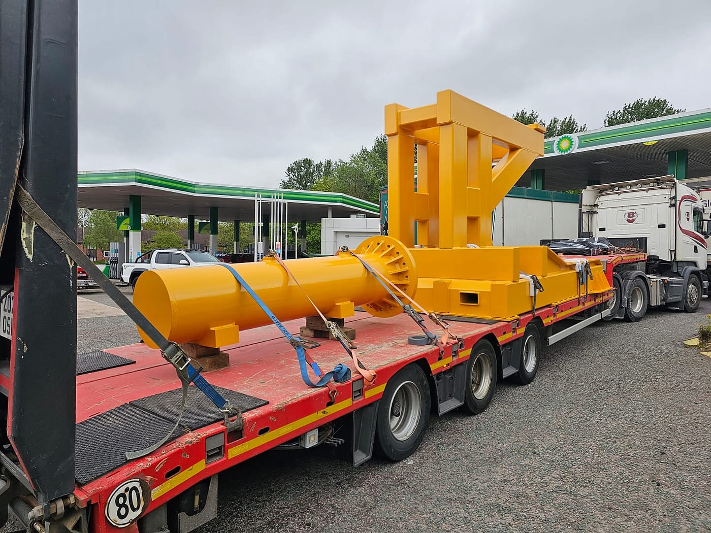 RN Roberts low loader with a secured load on the extended deck