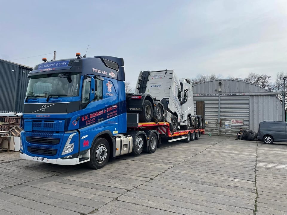 RN Roberts low loader transporting a vehicle
